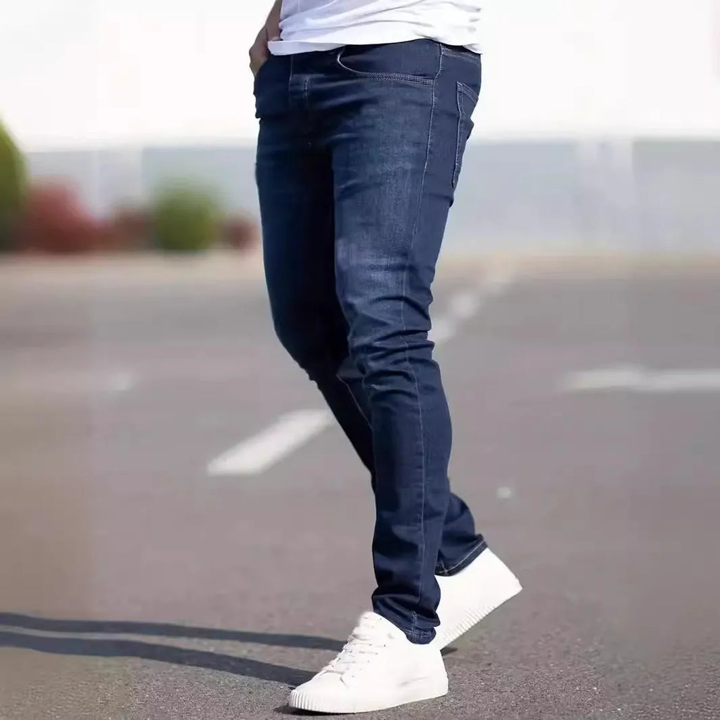 Men's dark blue slim fit jeans with skinny leg design and street fashion style