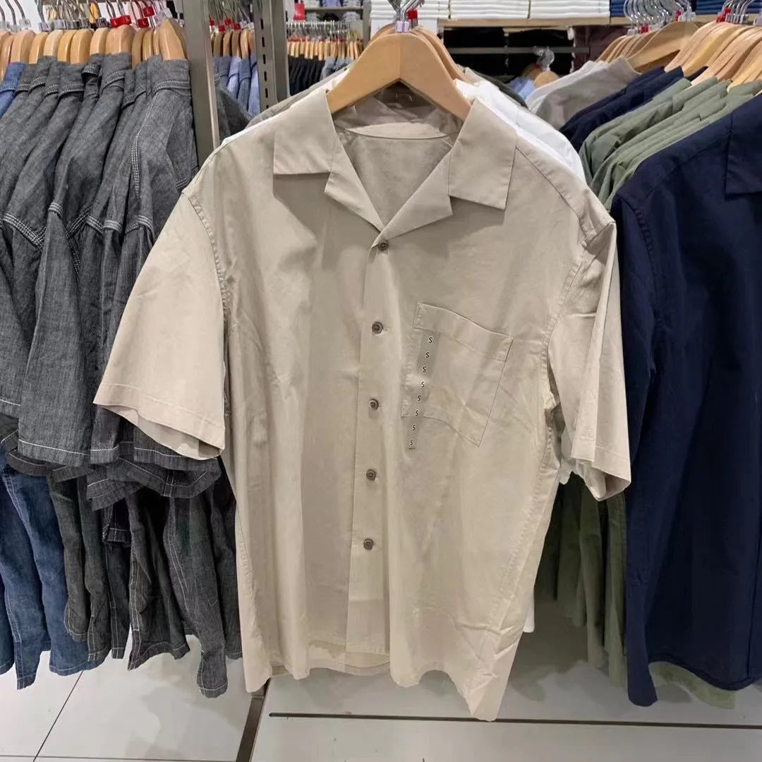 Man wearing a beige open collar casual shirt made from a cotton modal blend with Japanese styling