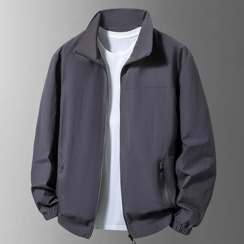 Large size men's casual stand collar zipper windproof jacket in black, front view on model