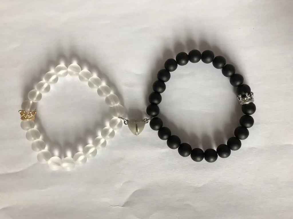 2pcs handmade glow-in-the-dark crown beaded bracelets in white and black with glass beads and luminous heart charm