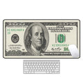 Large natural rubber non-slip mouse pad with decorative pattern on a desk.