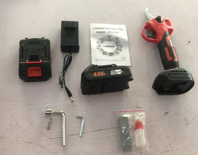 Wireless electric pruning knife with plastic case containing two batteries and charger for garden branch trimming