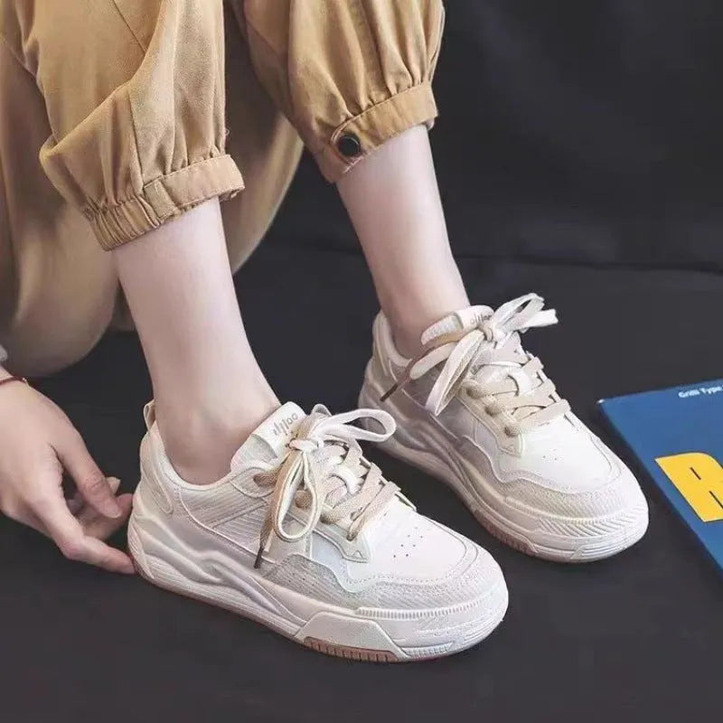 Women's pink and white low-top rubber sneakers with height increasing soles