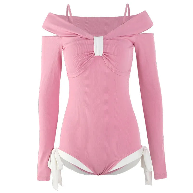 Women's long-sleeved one-piece swimsuit in polyester fibre available in pink and black colours