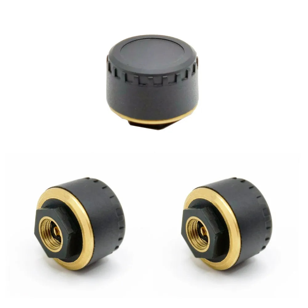 Four black Bluetooth tyre pressure monitors for smartphone connection with IP67 waterproof rating