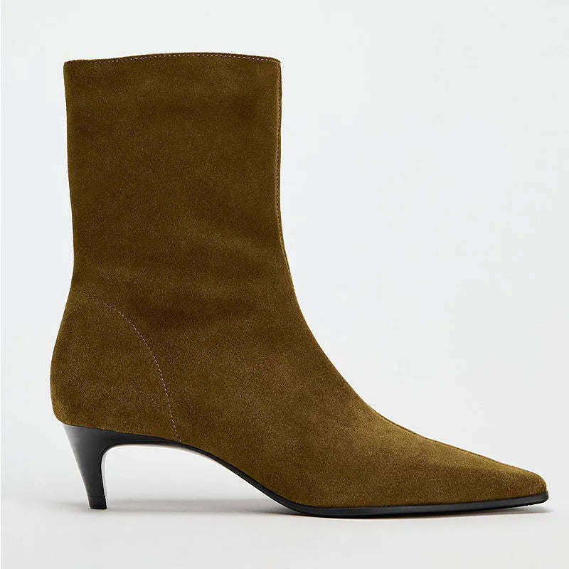 Brown square toe ankle boots with a side zipper and a mid-height kitten heel on a waterproof platform.