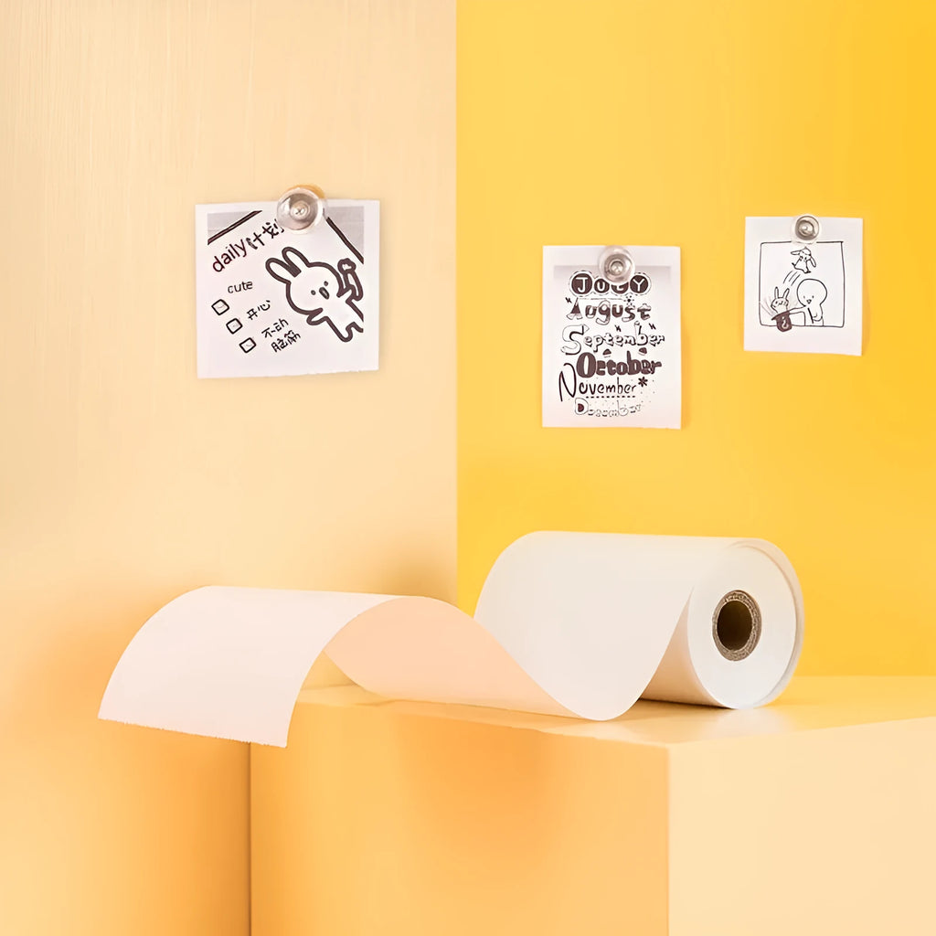 A box containing three rolls of white 57mm wide thermal paper for small printers.