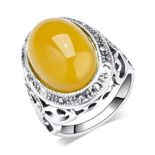 Geometric retro ring in antique silver amber colour with alloy electroplated construction