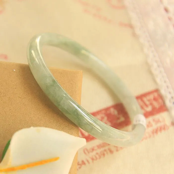 Green jade waxy Chinese bracelet with geometric beads in six wrist sizes from 53mm to 64mm