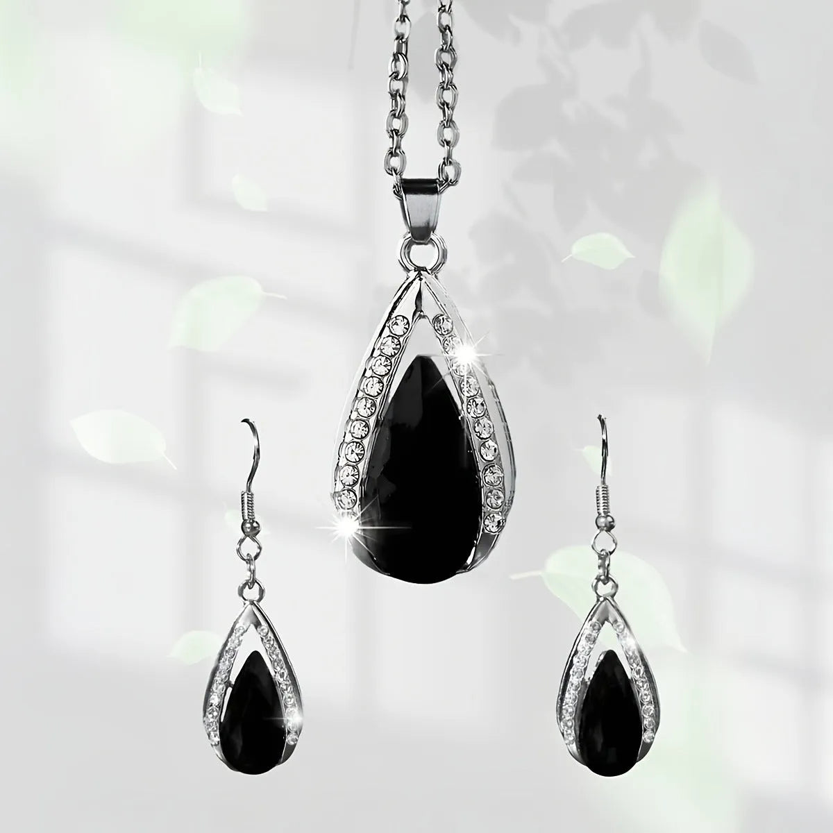 Teardrop glass pendant necklace and earrings suite in black or red alloy metal jewellery