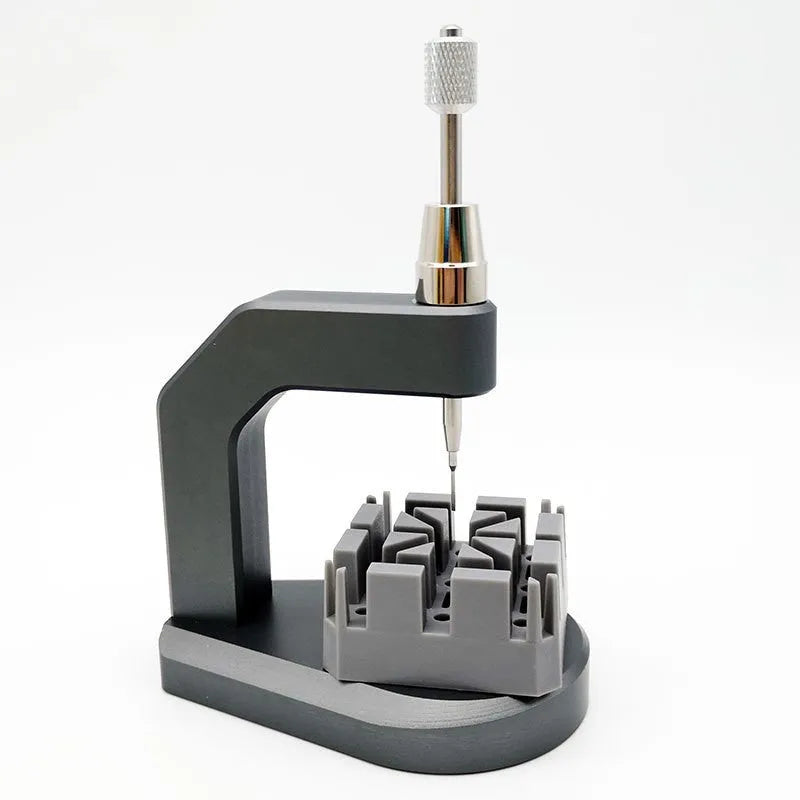 Silver tool steel press strap removal tool with a pointed blade for watch and jewellery repair.