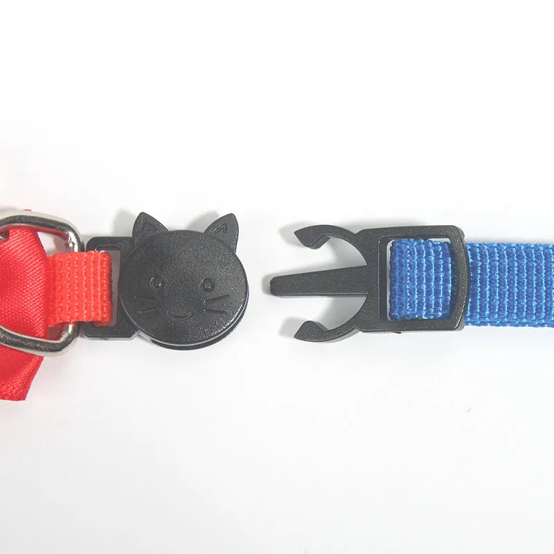 Striped nylon cat collar with bow decoration and bell in multiple colour options