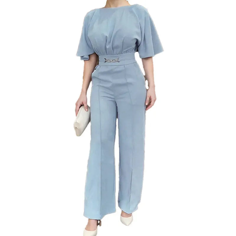 Blue polyester men's suit set with trousers and a long-sleeved top on a hanger