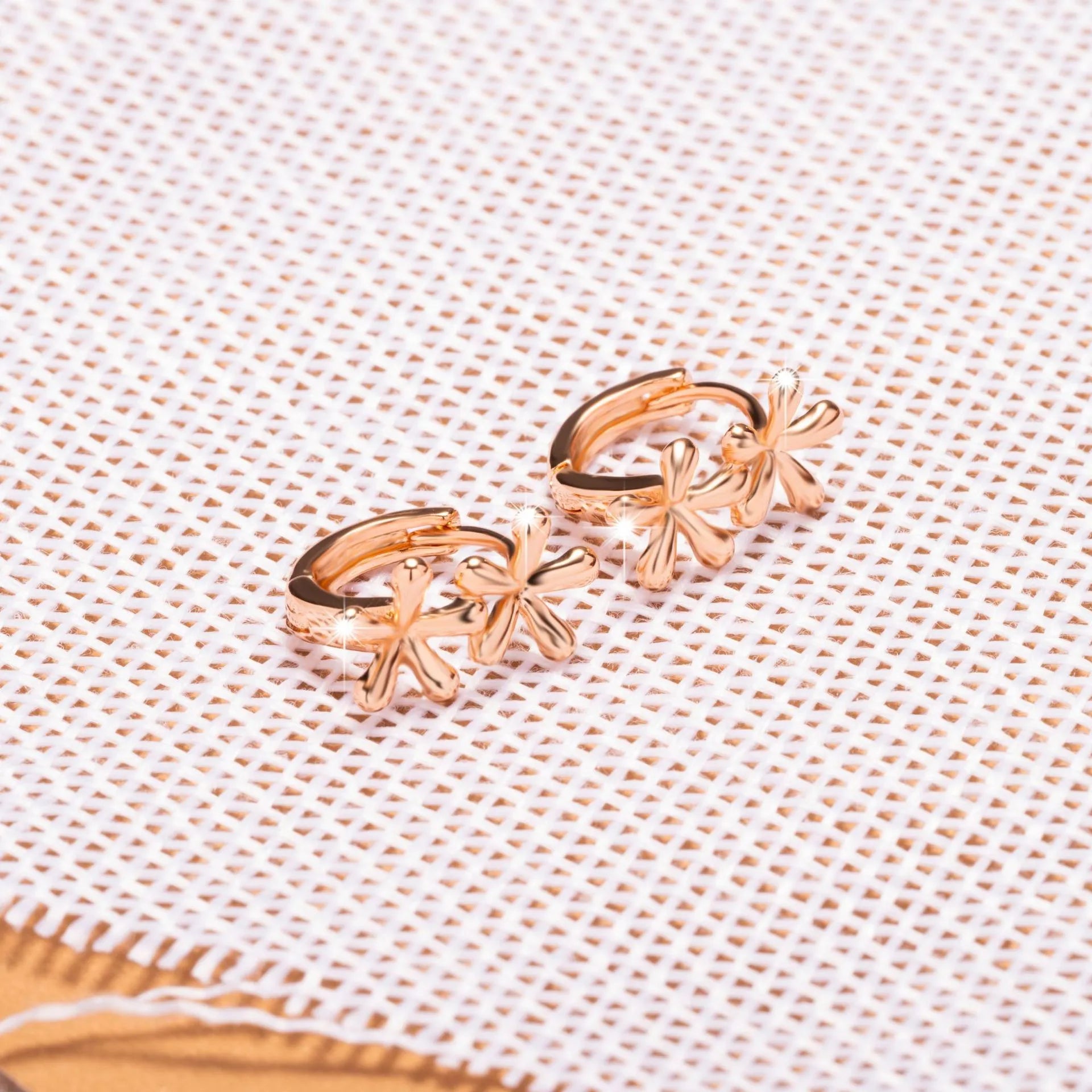 Rose gold circular earrings with waterdrop flower design for women