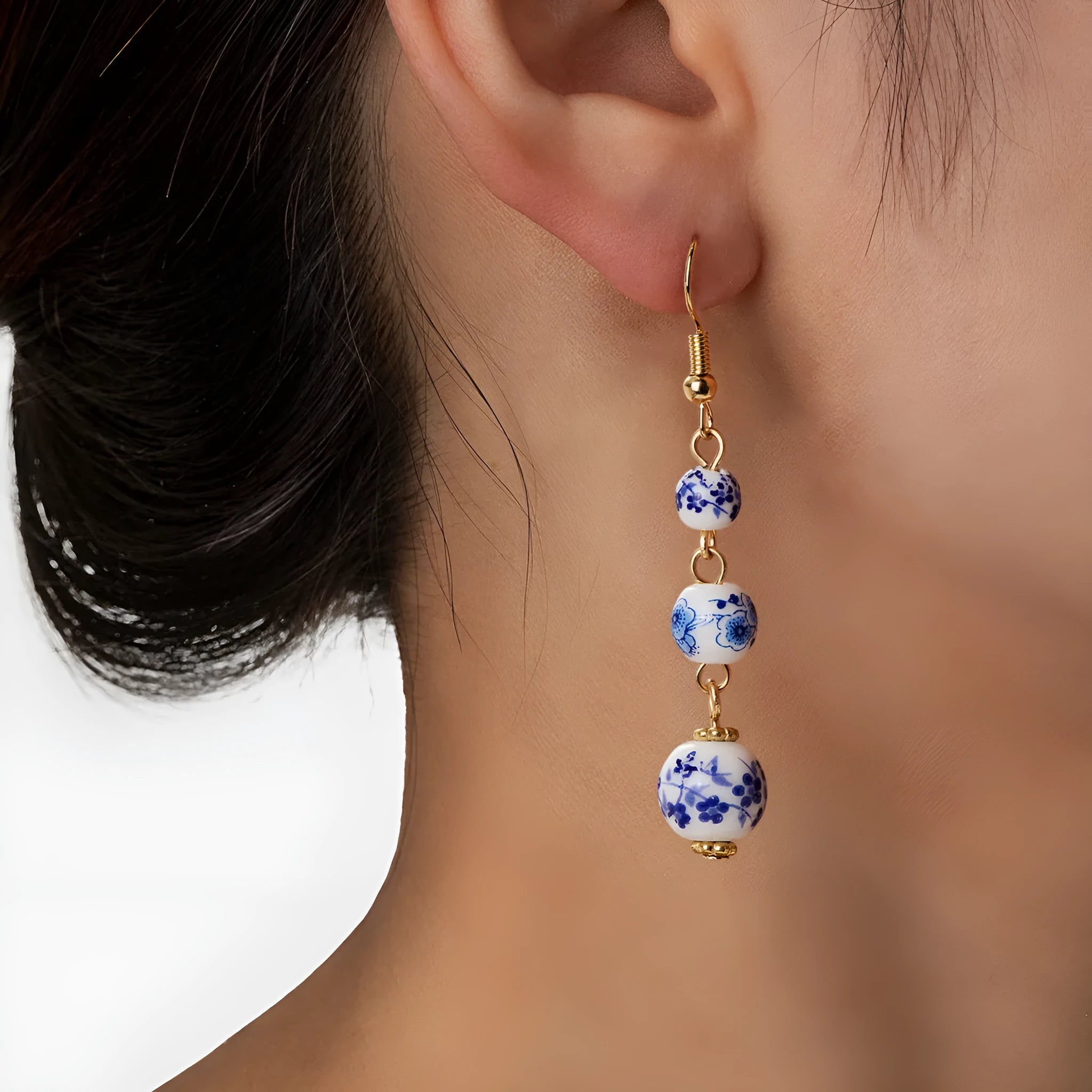 Blue and white porcelain ceramic bead retro earrings with geometric alloy components