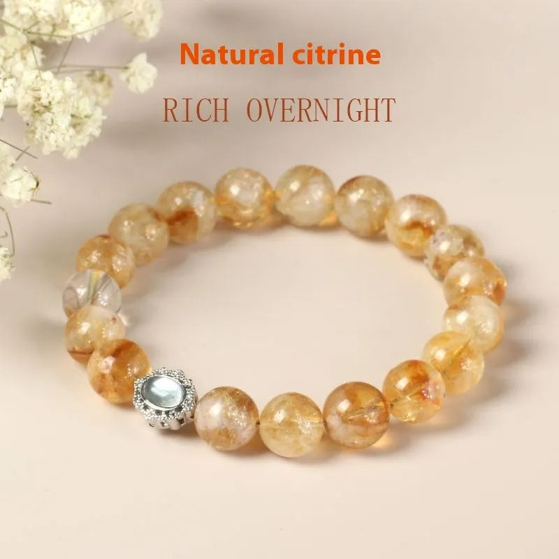 Geometric citrine crystal bracelet with 10mm stones on a wrist.