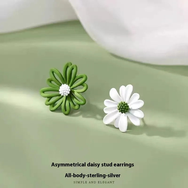 Alloy flower-shaped stud earrings in white and green, yellow and white, and blue orange colour combinations with butterfly clutch fastenings