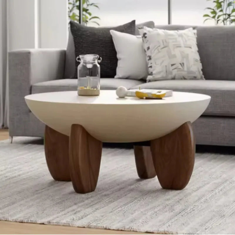 White solid wood coffee table with adjustable height feature and storage compartments
