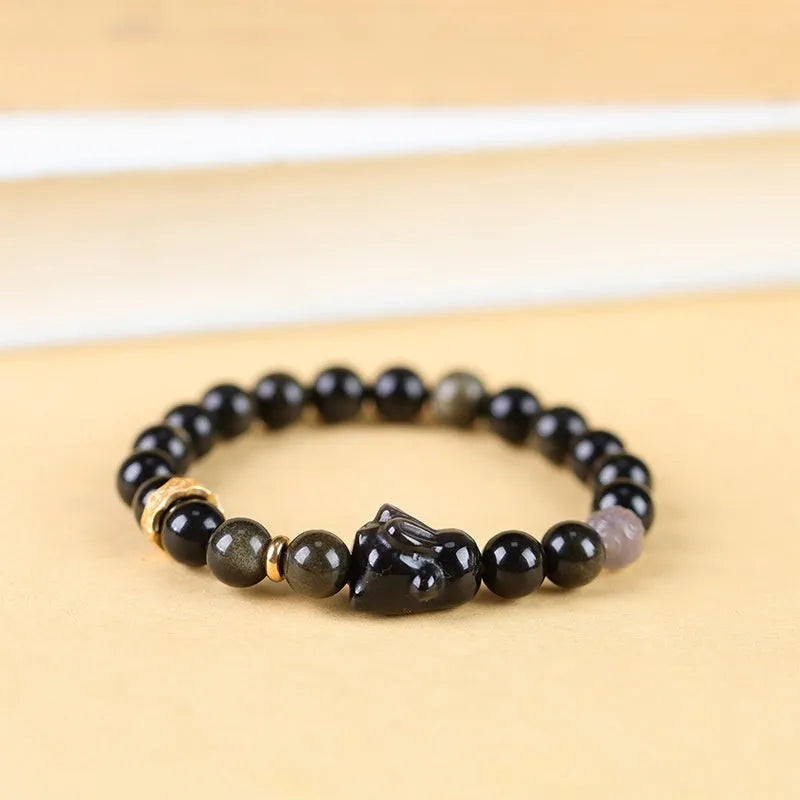 Handmade lying rabbit charm obsidian bracelet in Jin Yaoshi with gray agate details, national style unisex jewellery.