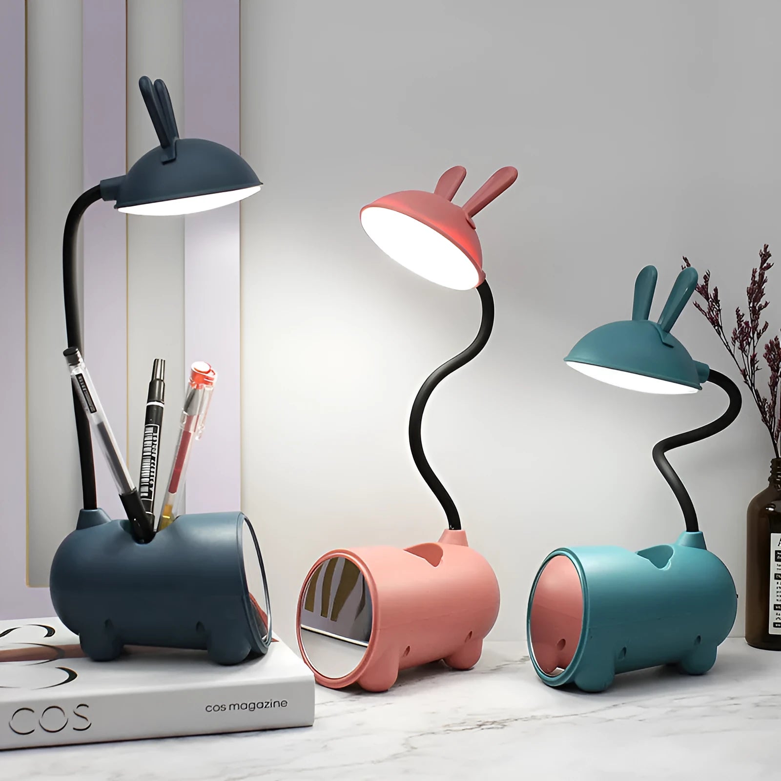 Green cartoon desk lamp with USB power and built-in pen holder container on desk