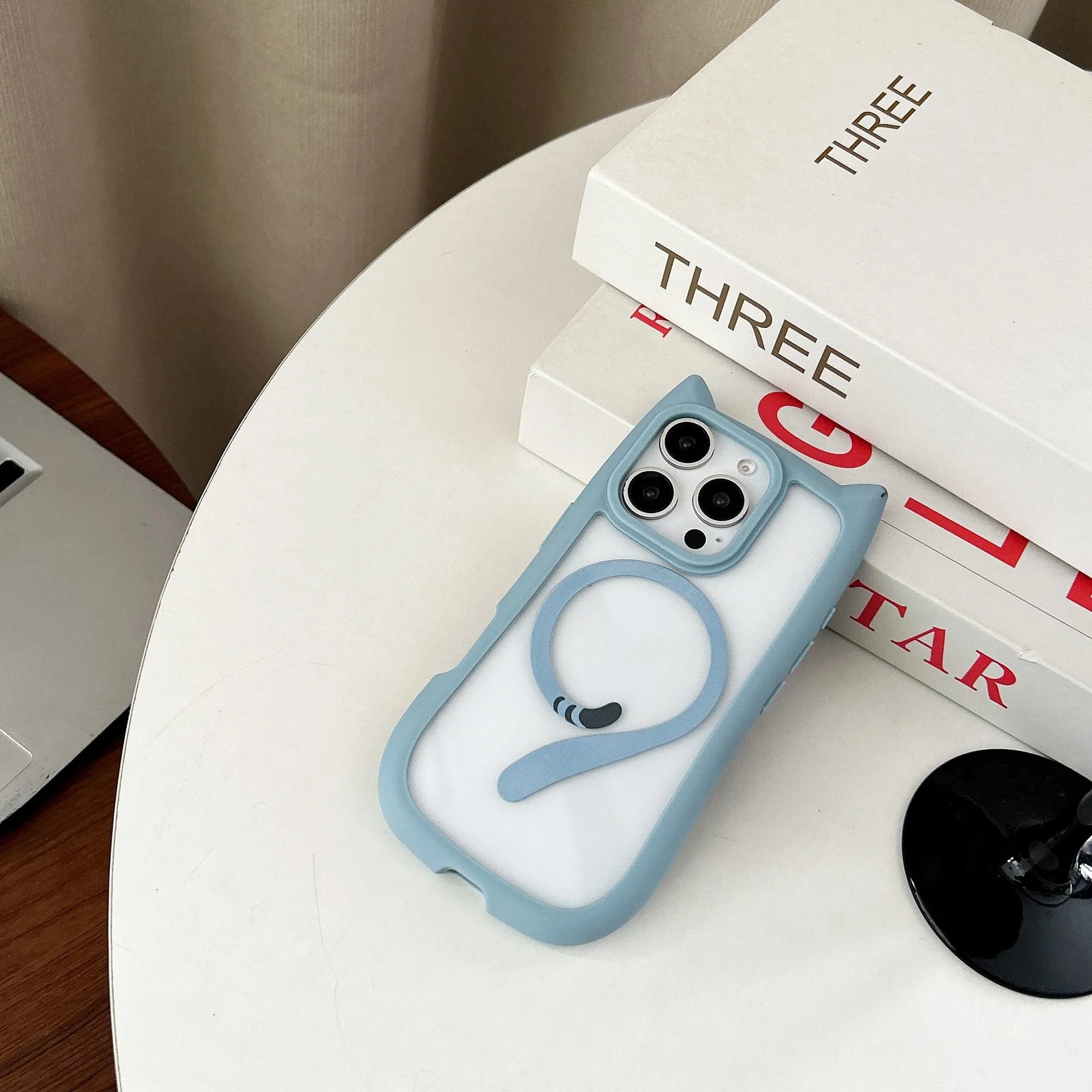 Transparent acrylic TPU phone case showing magnetic elements and wave pattern design for iPhone 17