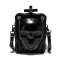 Black gothic crossbody bag with embossed skull design, chain strap and square shape