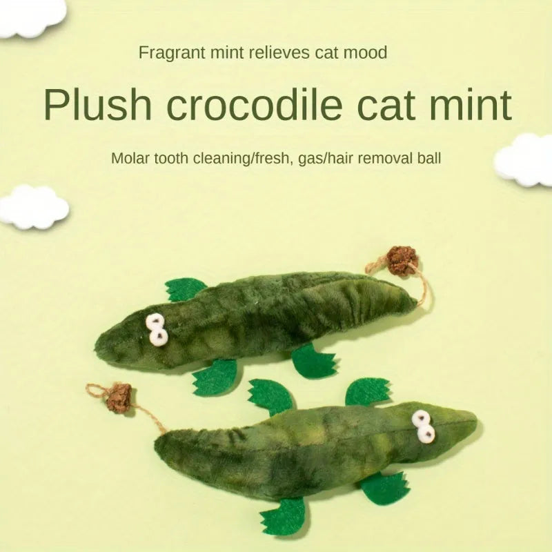Green plush alligator catnip toy with peppermint scent for feline oral cleansing