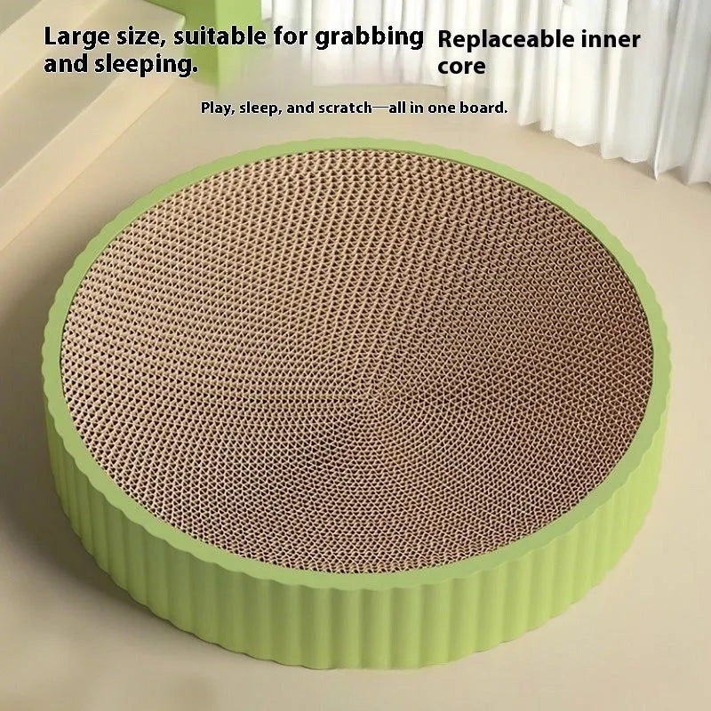 Round green cat scratching board with corrugated paper surface and two replacement packs