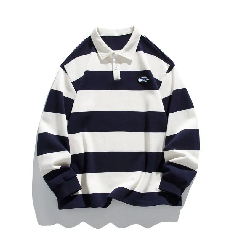 Man's striped polo shirt with lapel collar in loose fit, shown in sapphire blue colour.