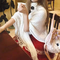 Women's cashmere blend triangle shawl cape with tassel detailing in various colours