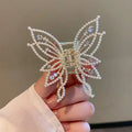Butterfly hair barrette with alloy metal construction and electroplated finish