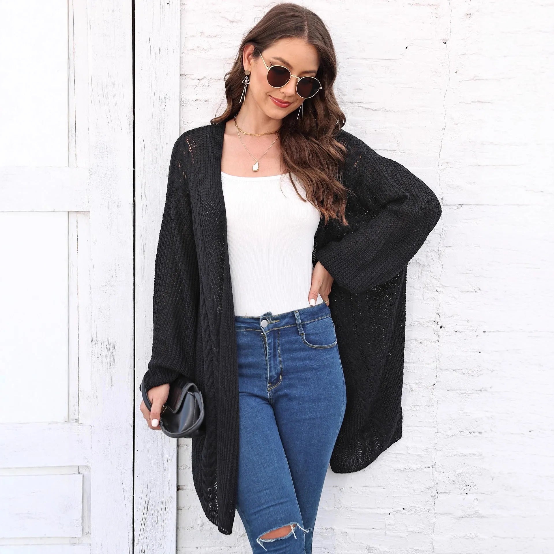 Women's loose fit acrylic sweater coat cardigan in a solid colour, shown in free size.
