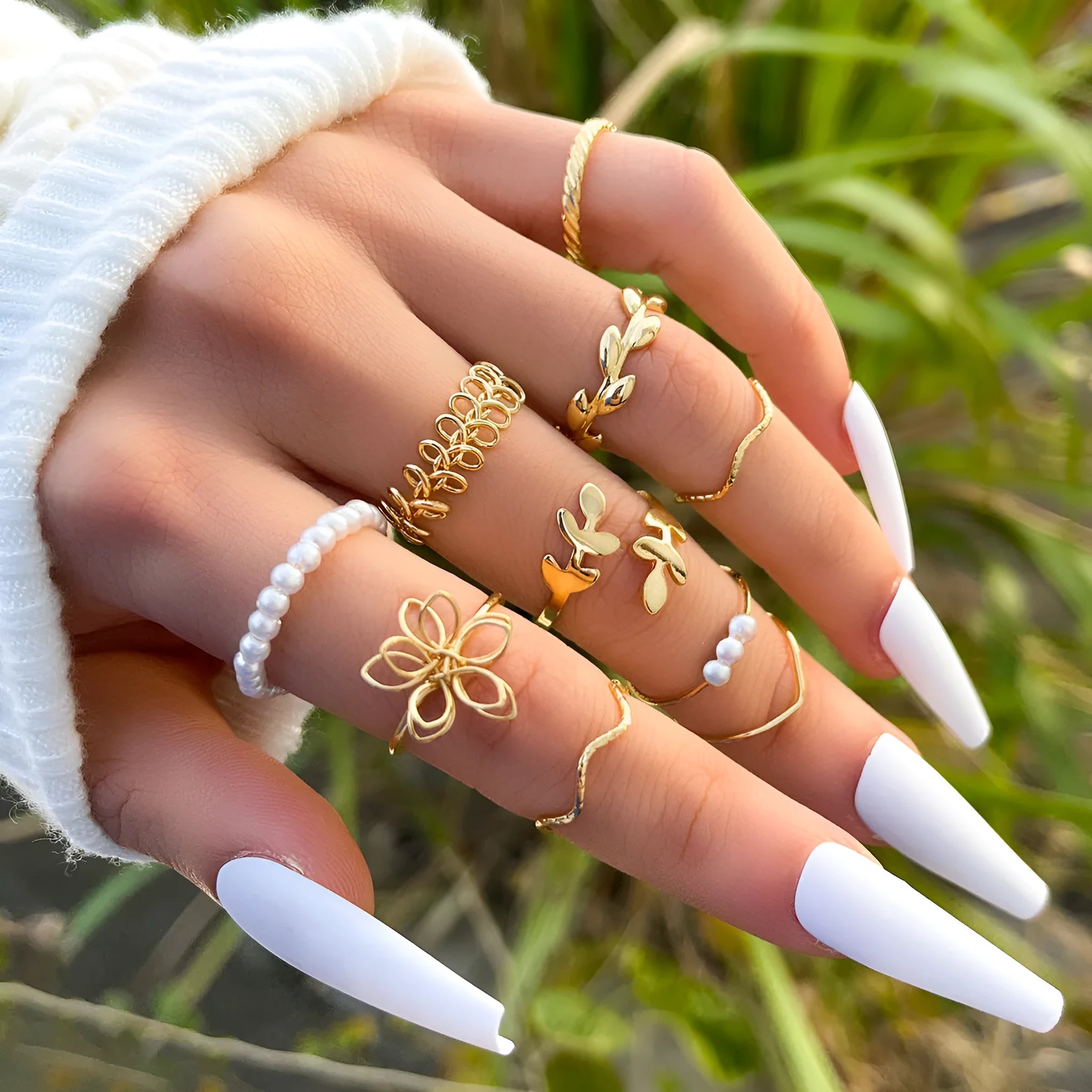 Openwork flower ring set with glossy gold finish and detailed floral pattern
