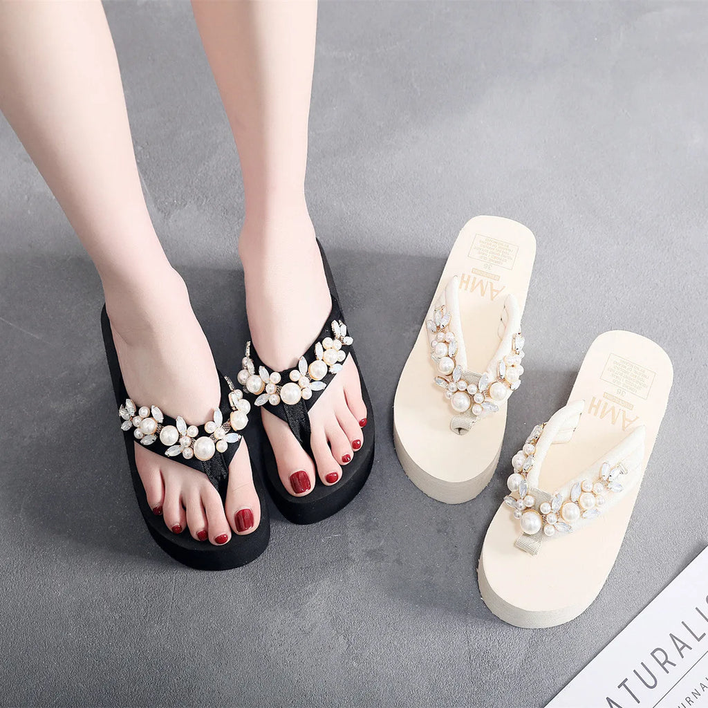 Women's black and beige high-heeled flip-flop slippers with cotton cloth uppers.