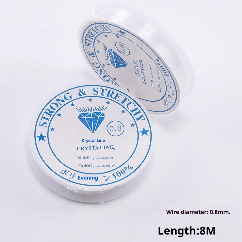 Clear fishing line elastic cord spool in transparent white for jewellery making and crafts