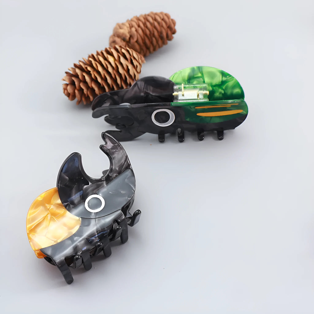 Handmade cartoon beetle and caterpillar design grip made from green cellulose acetate for stationery