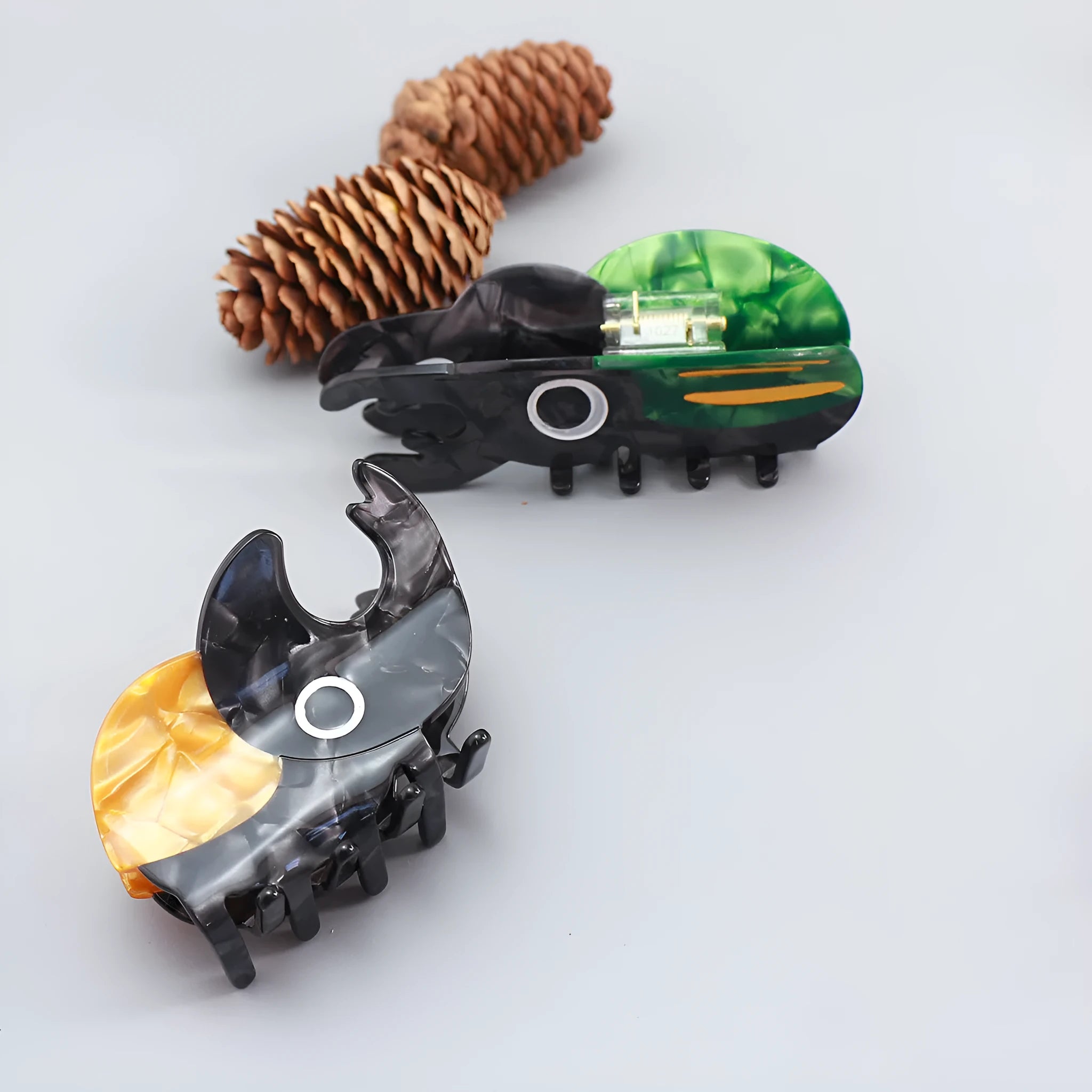 Handmade cartoon beetle and caterpillar design grip made from green cellulose acetate for stationery