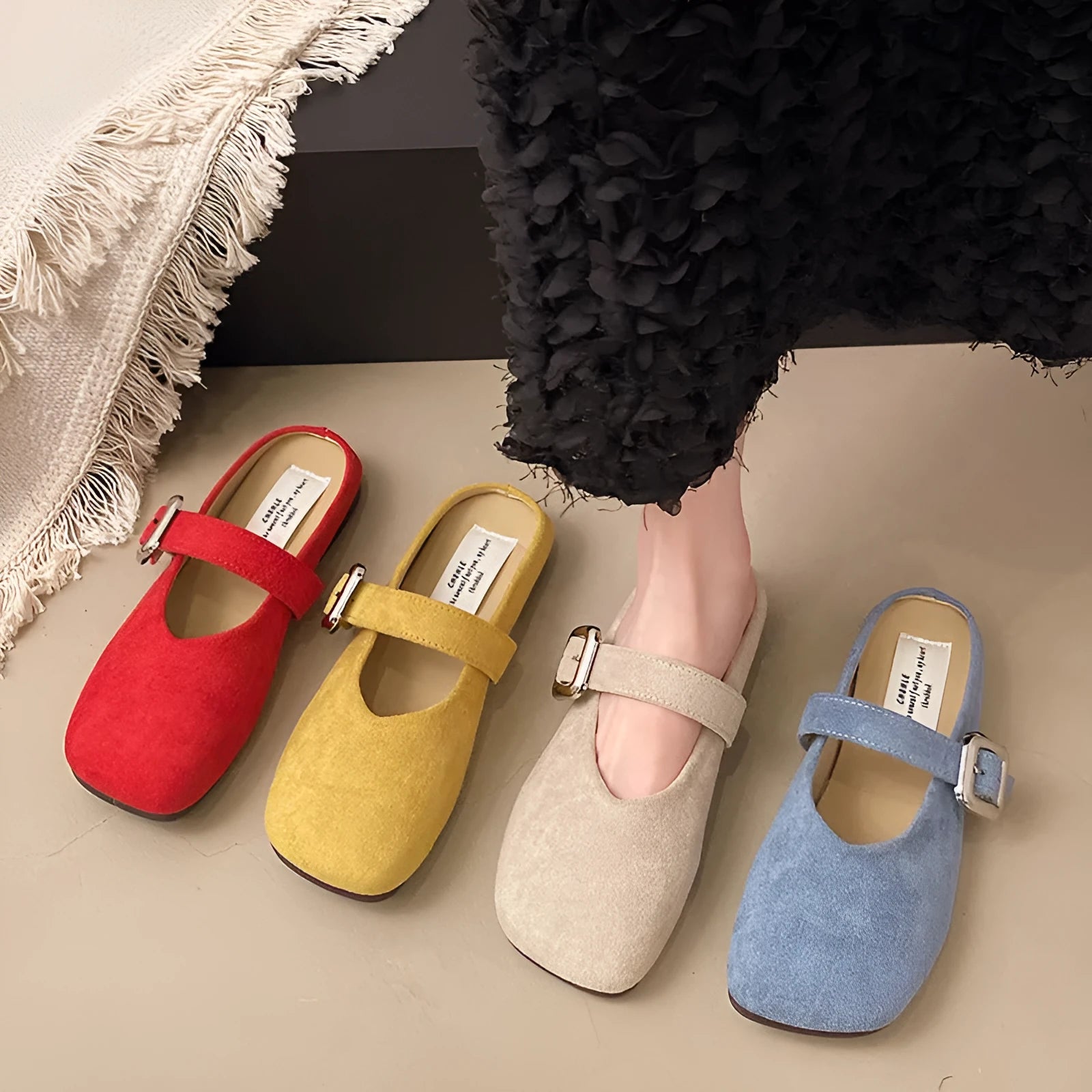 Women's flat closed toe slippers in apricot colour with square head and rubber sole