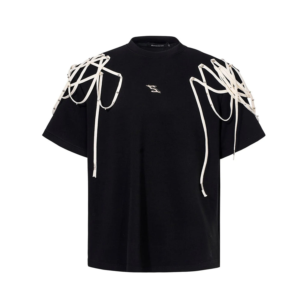 Black loose-fit short-sleeved t-shirt showing padded shoulder detail with rivet ribbon.