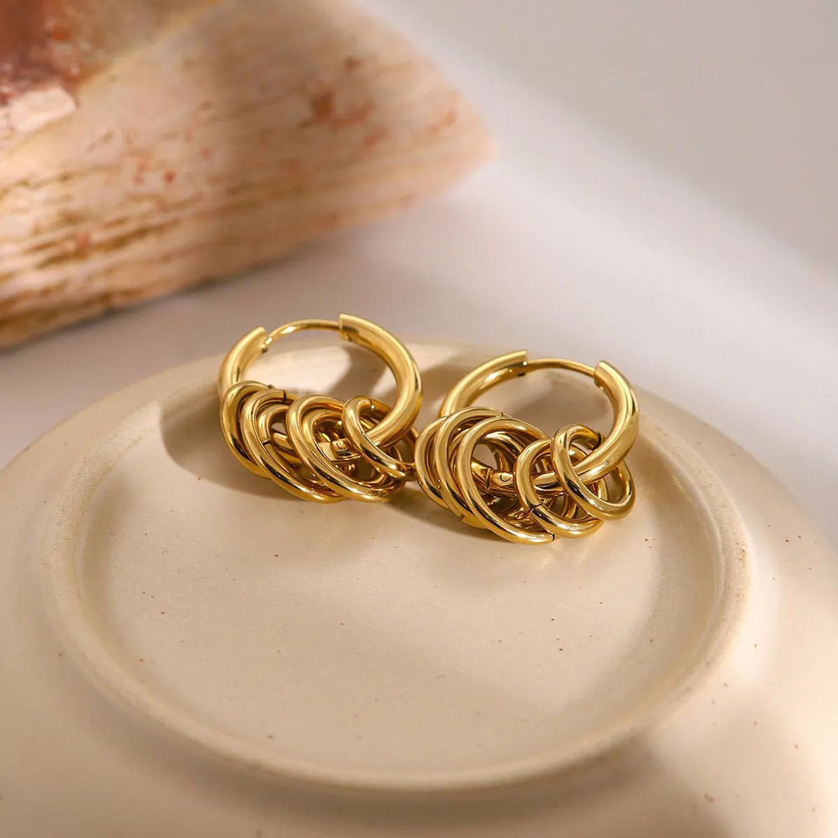 Ins style stainless steel colour matching earrings with electroplated finish showing unisex design