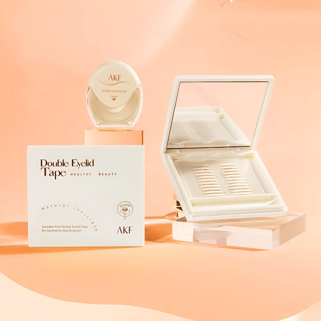Clear double eyelid stickers on a roll, showing the invisible lace material in Crescent and Olive shapes.