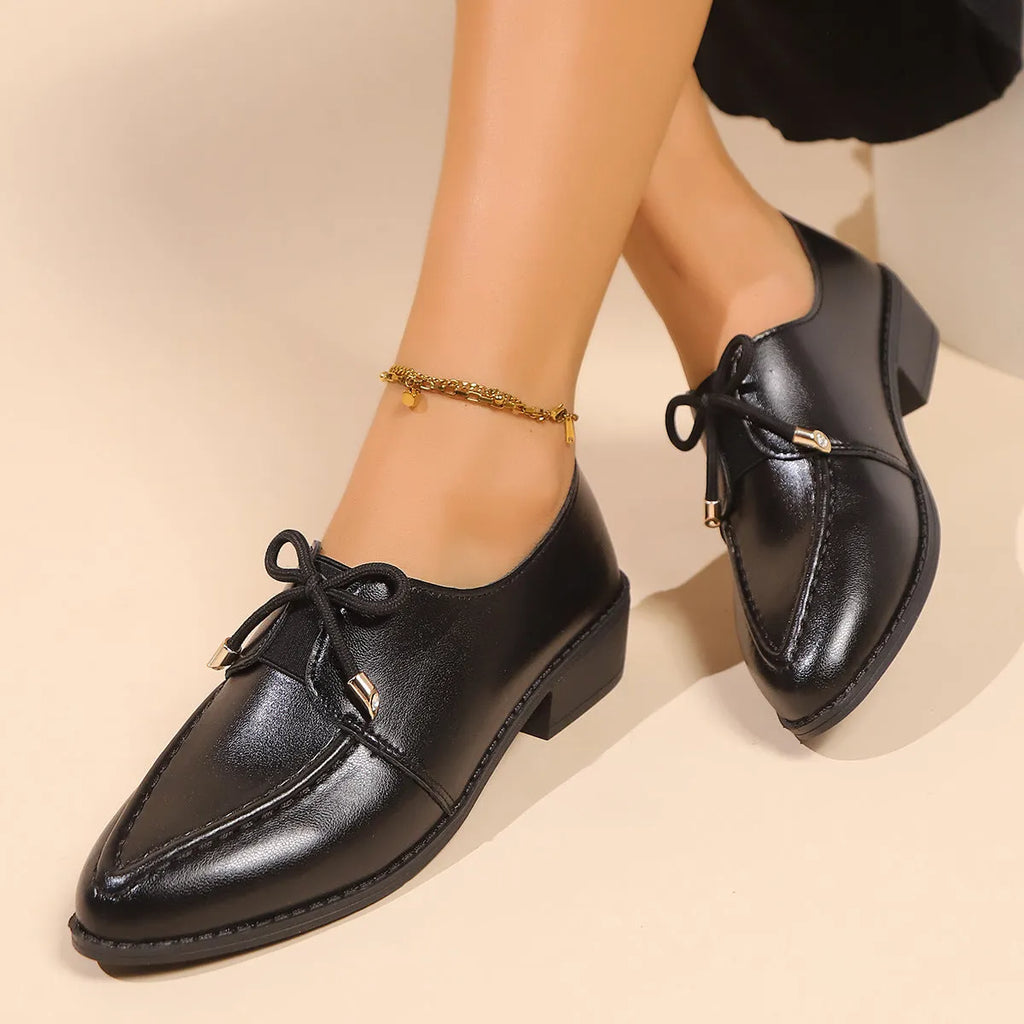 Women's British-style leather shoes with decorative bow details and rubber sole