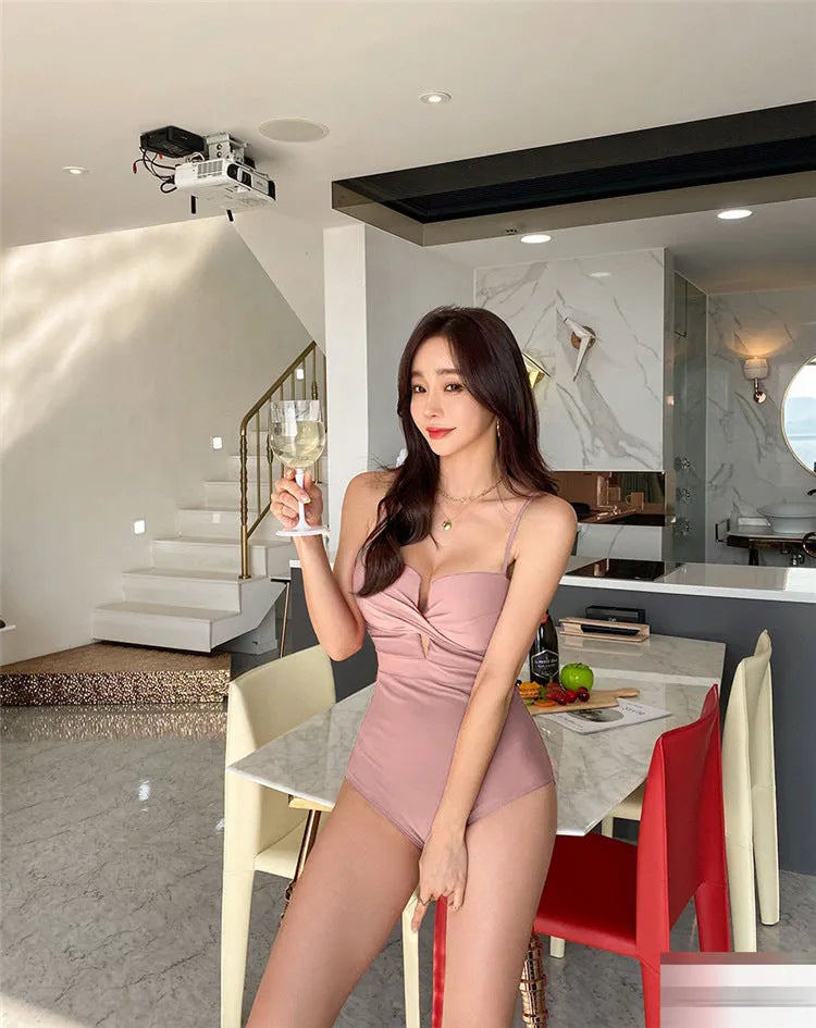 Ins Style women's solid colour push-up one-piece swimsuit with spaghetti straps in brown.