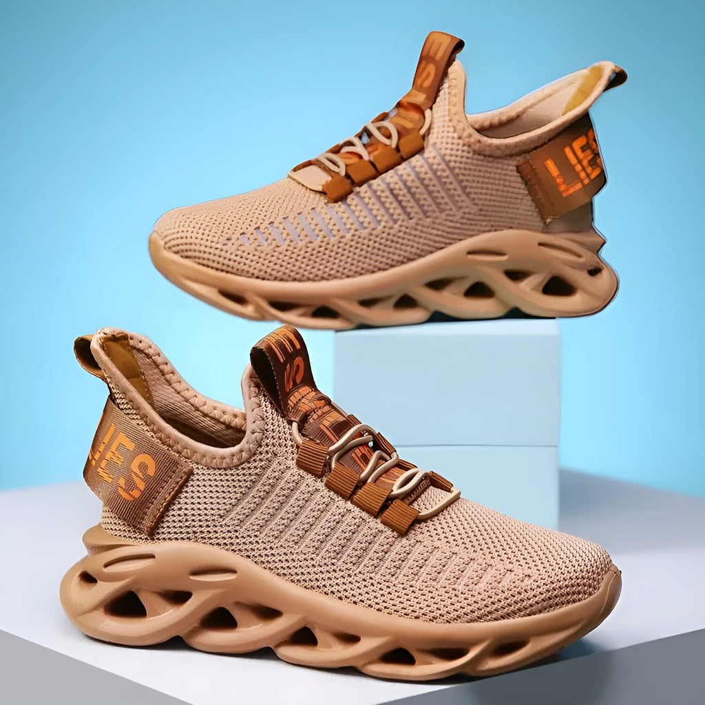 Children's casual sneakers with Velcro fastening in fabric and EVA, shown in black, khaki, and white colour options.