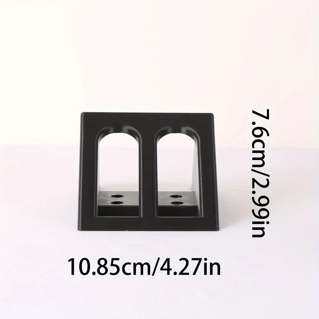 Black plastic pistol stand gun holder measuring 10.85cm x 7.6cm for displaying replica firearms