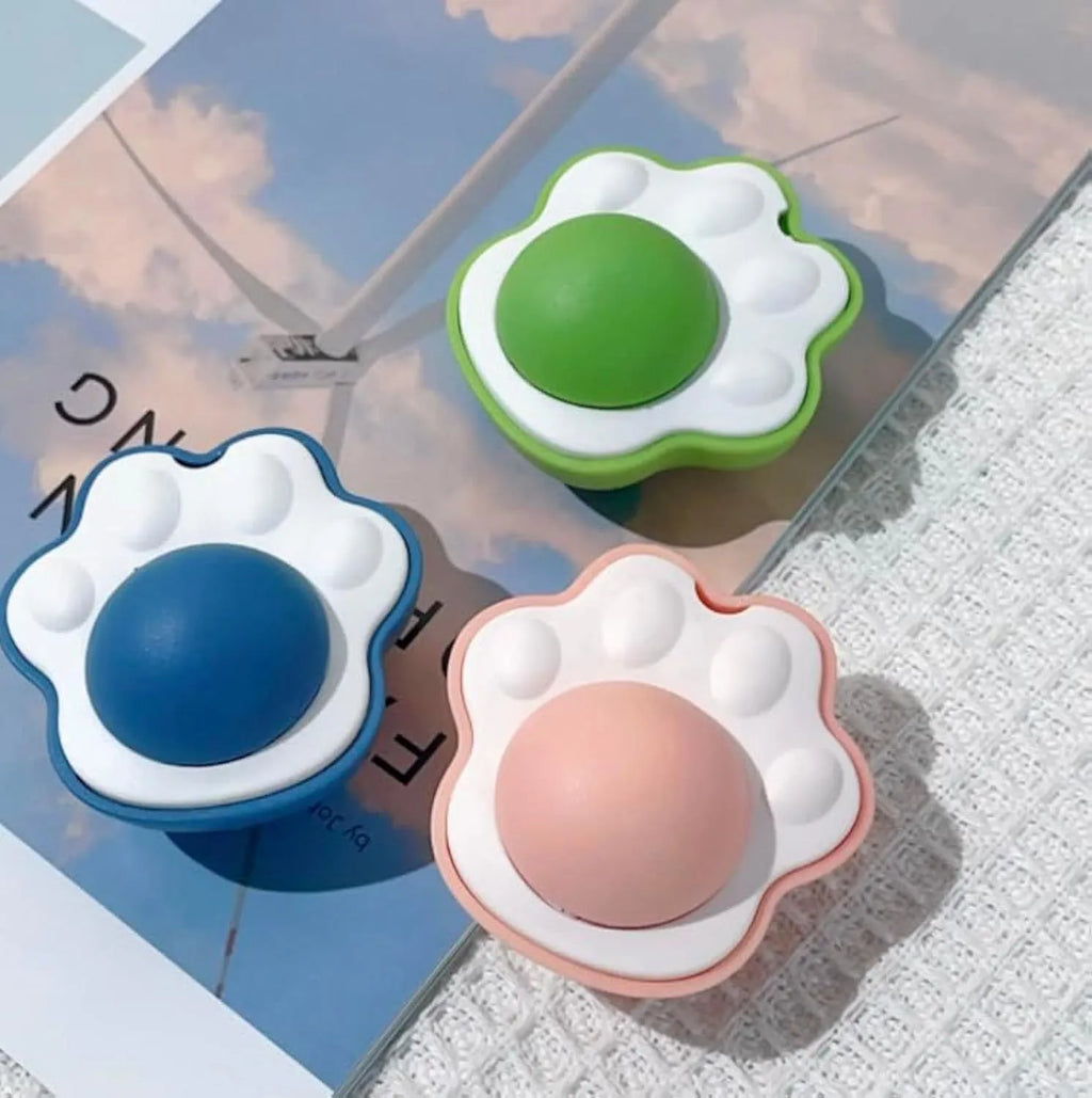 Edible catnip dental chew balls in blue, green, and pink colours measuring 45x33x50mm