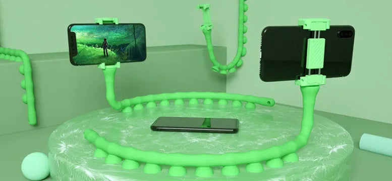 Black flexible rubber phone holder with long 62cm arm and suction cup, holding a mobile phone at an angle.