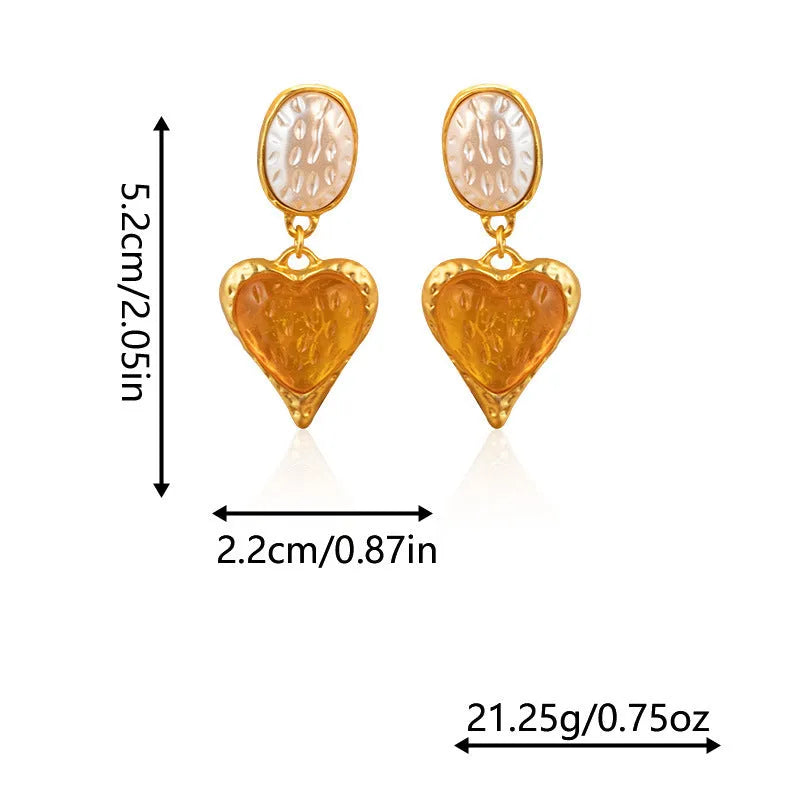 A pair of oval-shaped heart stud earrings with a silver needle texture in purple, red, green, and yellow white colours