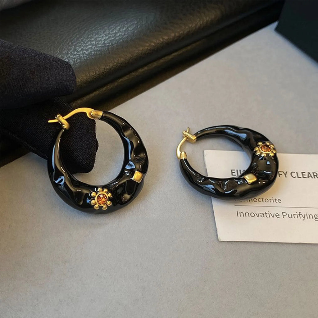 Hong Kong style retro ear studs with rhinestone detailing in black and red colour options