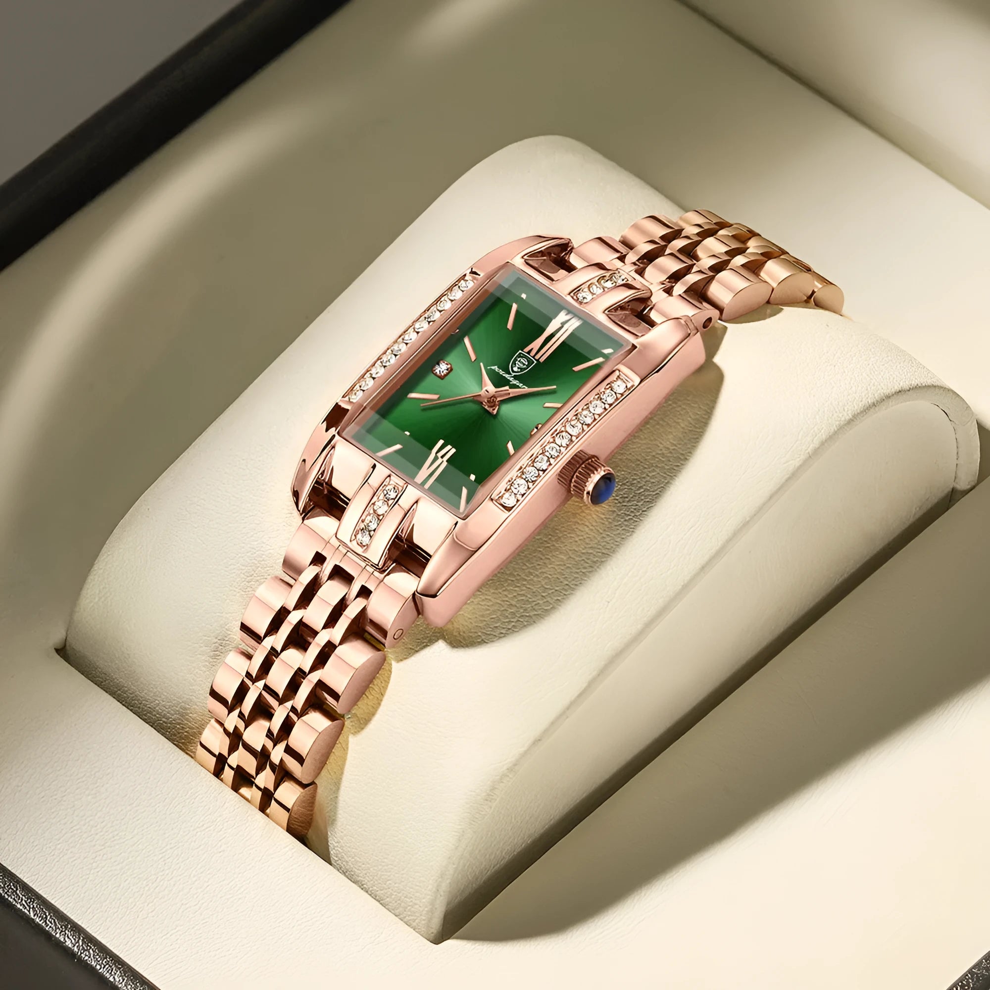 Ladies rectangular stainless steel quartz watch with green face and steel bracelet on white background
